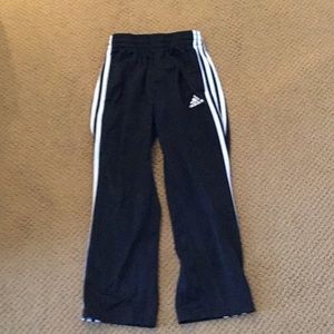 Adidas sweatpants.